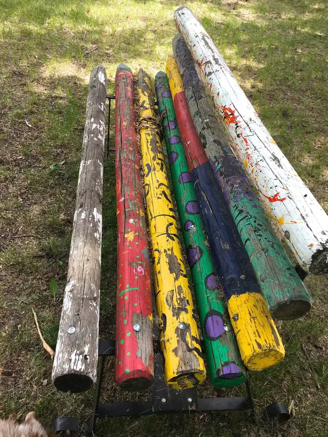Painted log pencil bench